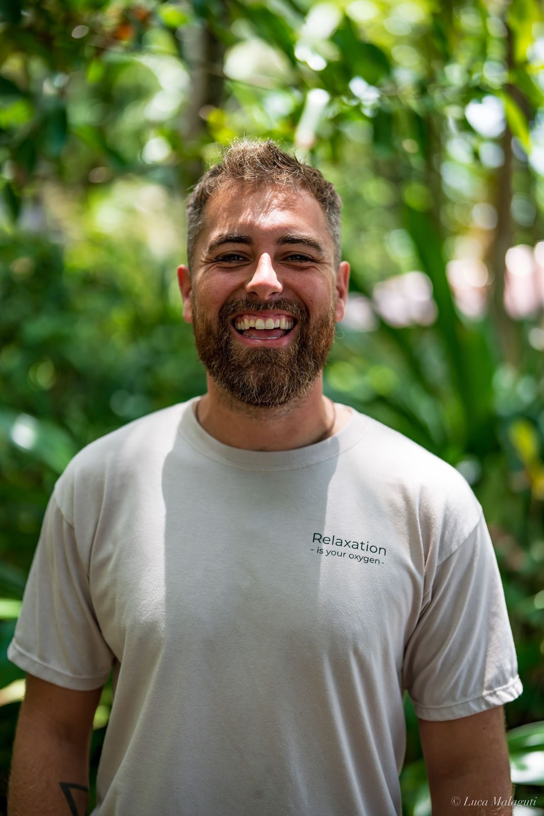 Jake Lipohar smiling outdoors